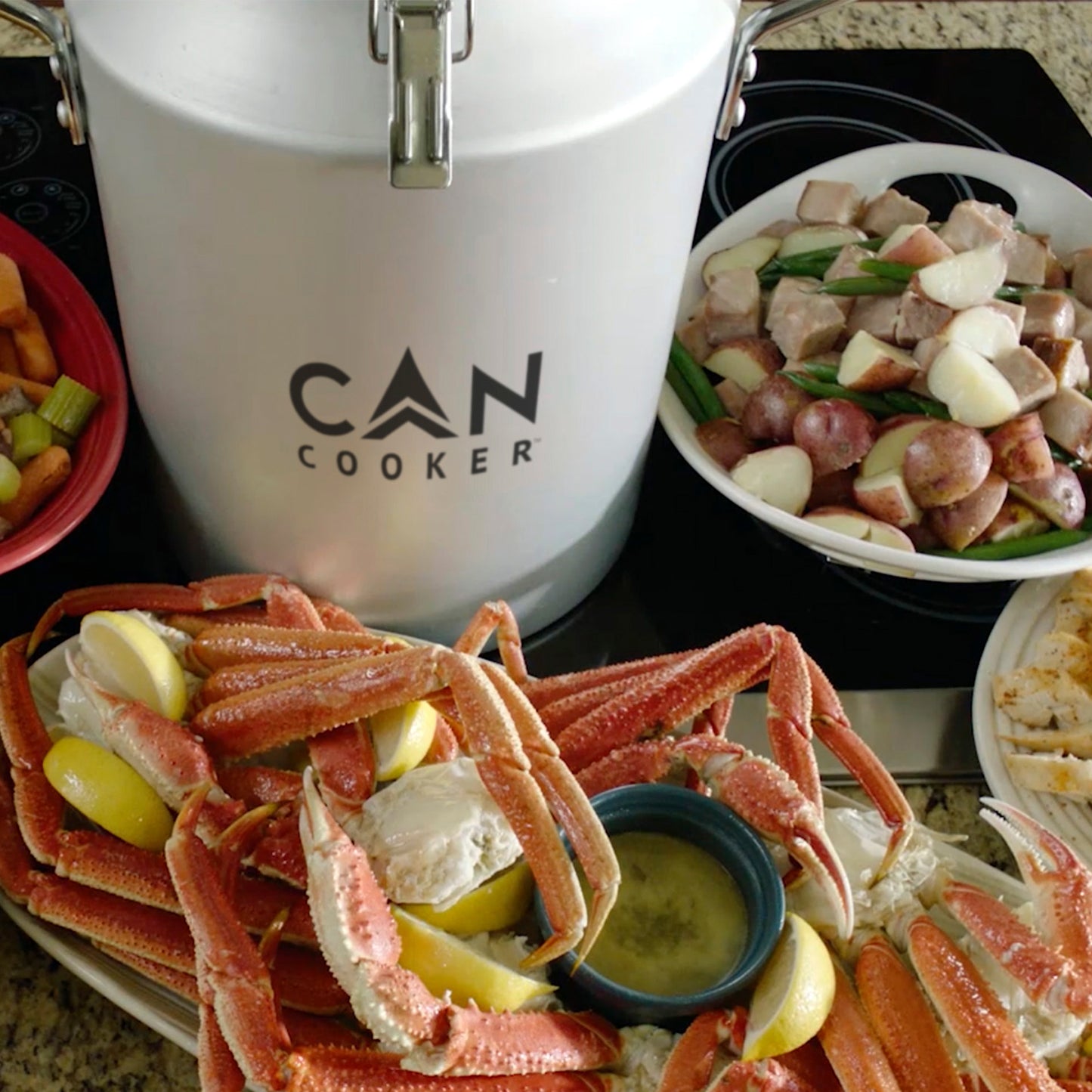 CanCooker Original with seafood and vegetables, demonstrating its capacity for steaming large meals in home kitchens.